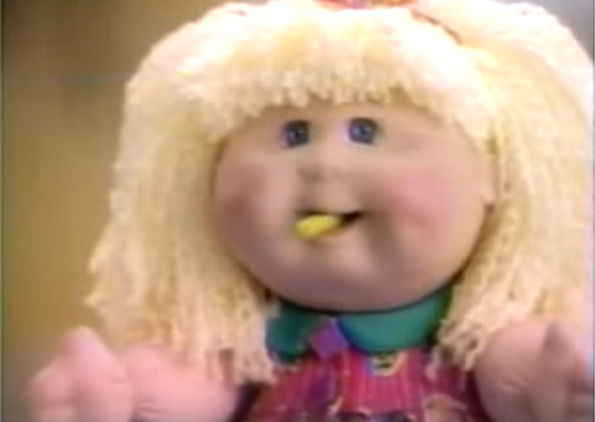 cabbage patch kid eats food